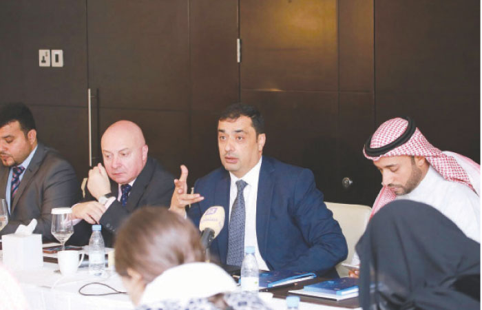 Officials of KPMG Al Fozan & Partners during the roundtable