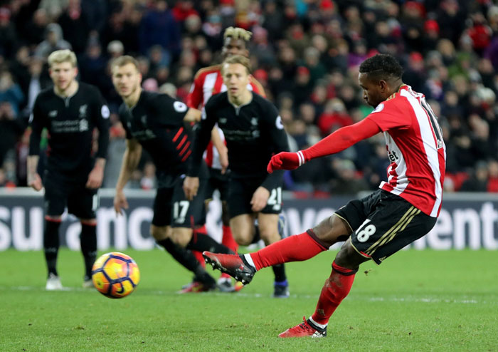 Sunderland’s Jermain Defoe scores his side’s second goal of the game from the penalty, against Liverpool during their Premier League match at the Stadium of Light in Sunderland, England, Monday. - AP