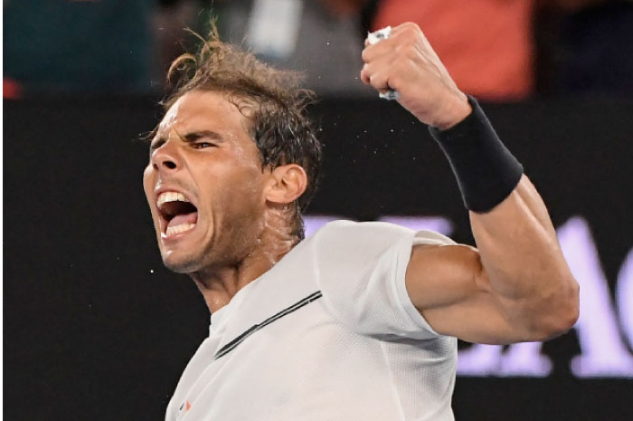 Spain’s Rafael Nadal celebrates his victory against France’s Gael Monfils during their men’s singles fourth round match of the Australian Open in Melbourne Monday. - AFP