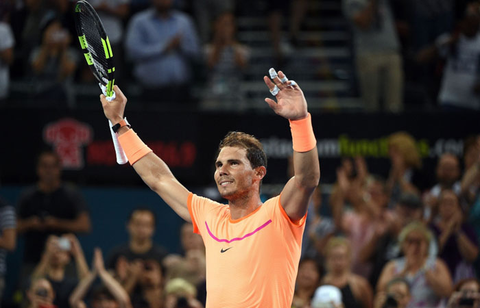 Rafael Nadal of Spain celebrates his victory against Alexandr Dolgopolov of Ukraine in the men’s round one at the Brisbane International tennis tournament Tuesday. - AFP