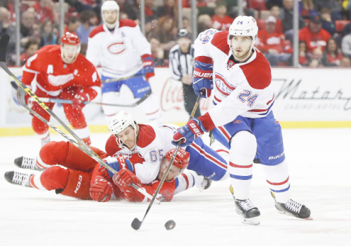 Montreal Canadiens’ left-wing Phillip Danault (No. 24) carries the puck against the Detroit Red Wings in the first period of their NHL hockey game in Detroit Monday. - AP