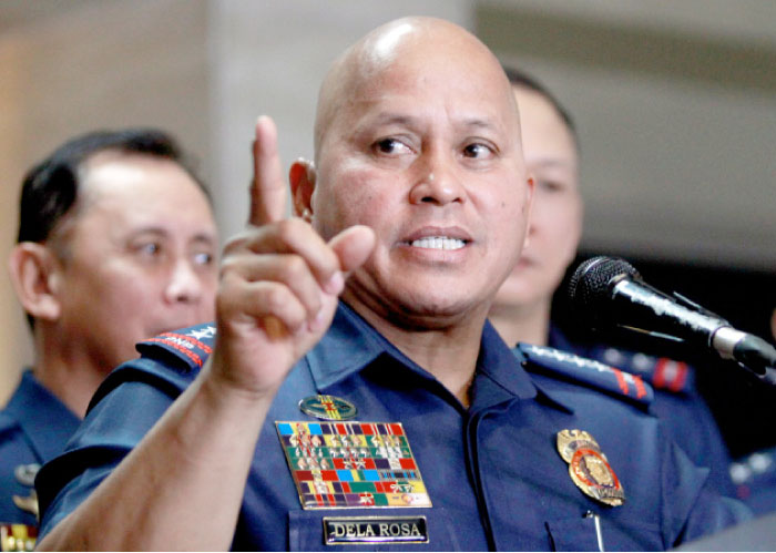 Philippine National Police (PNP) Director General Ronald Dela Rosa gestures during a news conference at the PNP headquarters in Quezon city, Metro Manila, on Monday. — Reuters