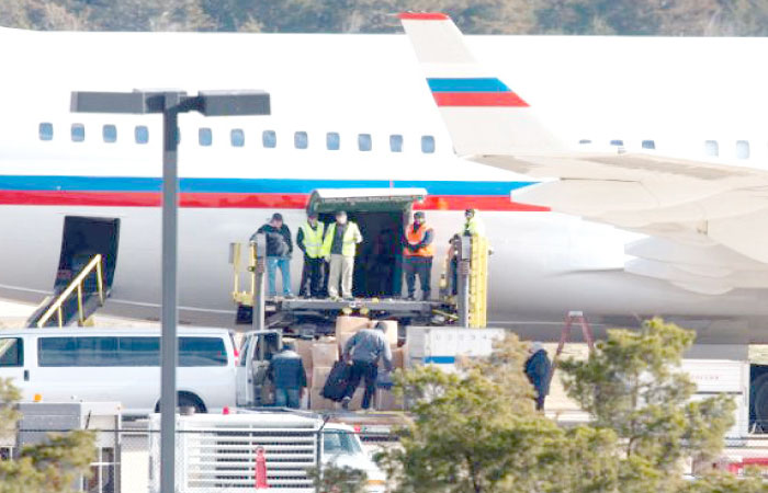 A Russian aircraft is loaded with cargo at Dulles International Airport in Sterling, Virginia, just outside Washington, D.C., on Sunday. — AFP