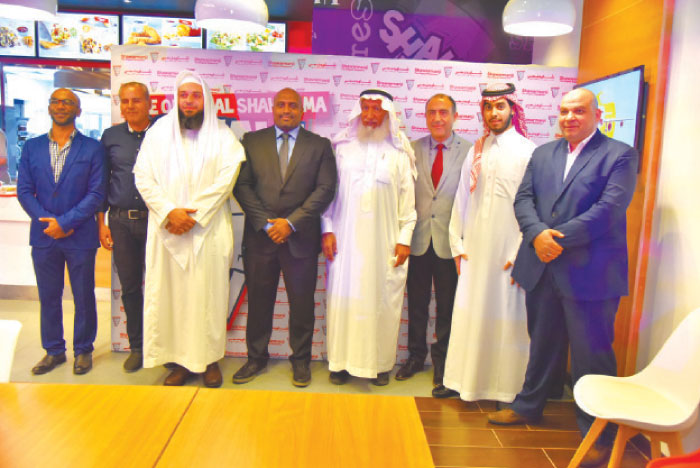 Key officials of Shawarmanji and Yateeb Restaurants during the opening at Jamea Plaza, Jeddah