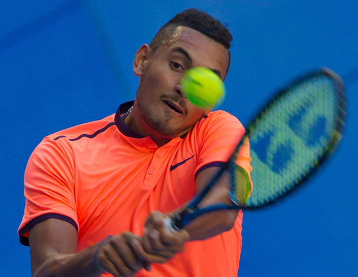 Nick Kyrgios of Australia hits a return against Adam Pavlasek of the Czech Republic during their seventh session men’s singles match at the Hopman Cup tennis tournament in Perth Tuesday. - AFP