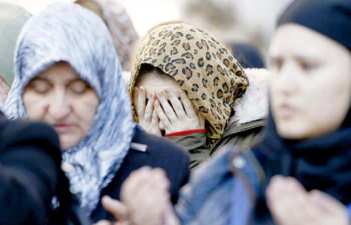 Relatives react at the funeral on Monday of Busra Kose, a victim of an attack by a gunman at Reina nightclub, in Istanbul, Turkey. — Reuters