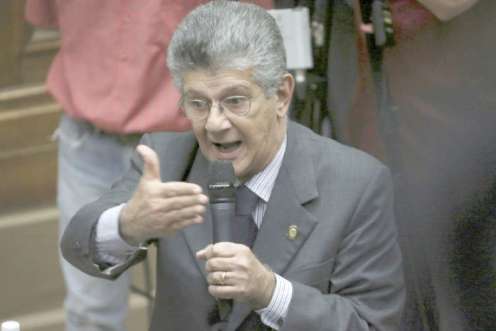 Opposition lawmaker Henry Ramos Allup addresses a session at the National Assembly in Caracas, Venezuela, on Monday. — AP