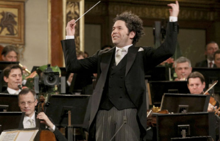 Maestro Gustavo Dudamel of Venezuela conducts the Vienna Philharmonic Orchestra during the traditional New Year’s Concert at the Golden Hall of the Musikverein in Vienna, Austria on Monday. - AP