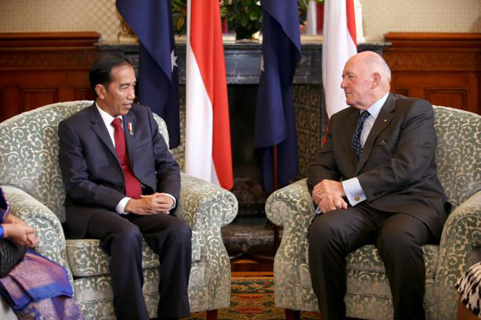 Indonesian President Joko Widodo, left, meets with Australian Governor-General Peter Cosgrove at Admiralty House in Sydney on Sunday. — AFP