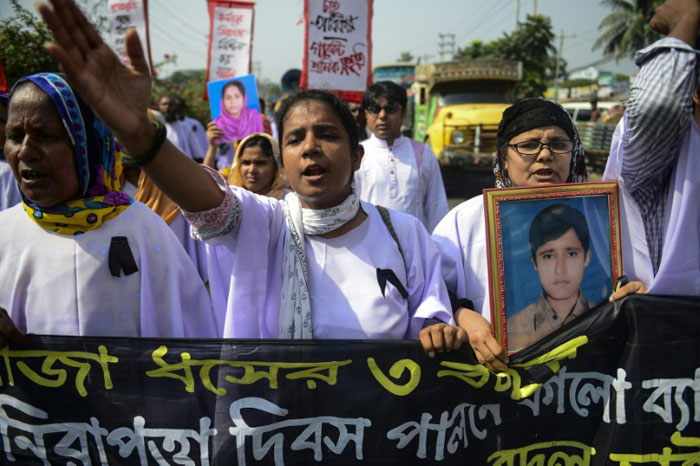 A protest in Dhaka in this file photo on the third anniversary of the Rana Plaza garment factory disaster that killed over 1,100 people. — AFP