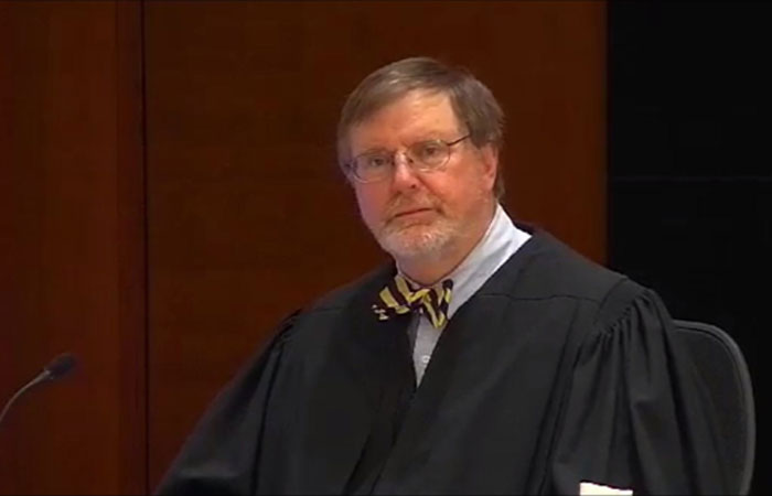 In this frame grab from video released by the United States Courts, US District Judge James Robart, in Seattle, rules on the travel ban imposed by US President Donald Trump. — AP
