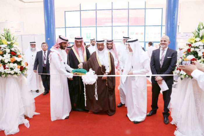 Eng. Saleh S. Al-Sulami (right), Deputy Minister for Industrial Affairs, Ministry of Energy, Industry and Mineral Resources;  Abdulrahman bin Saleh Alfalih (to his right), executive VP of SABIC, inaugurate the 14th edition of the Saudi Print & Pack and Saudi Plastics and Petrochemicals shows at the Jeddah Center for Forum and Events on Monday