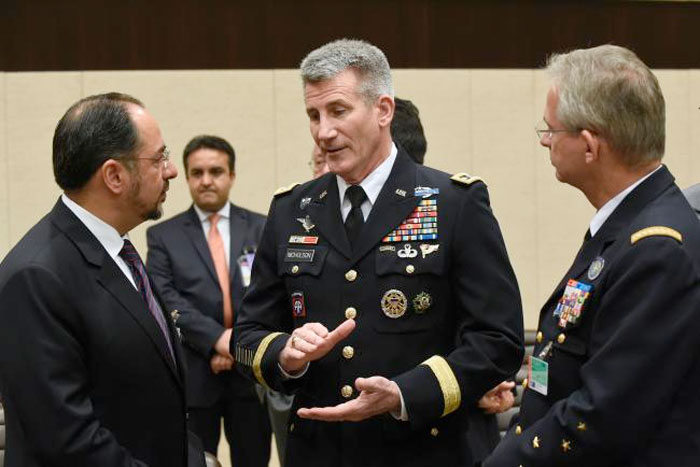 Afghan Foreign Minister Salahuddin Rabbani (L) talking with with Commander of Allied and Command John W. Nicholson (C) and French Air Force Chief General Denis Mercier (R) during a Foreign Affairs meeting at the NATO headquarters in Brussels. — AFP