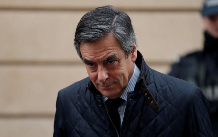 Francois Fillon, former French prime minister, member of The Republicans political party and 2017 presidential candidate of the French center-right, leaves home in Paris, France, on Wednesday. — Reuters
