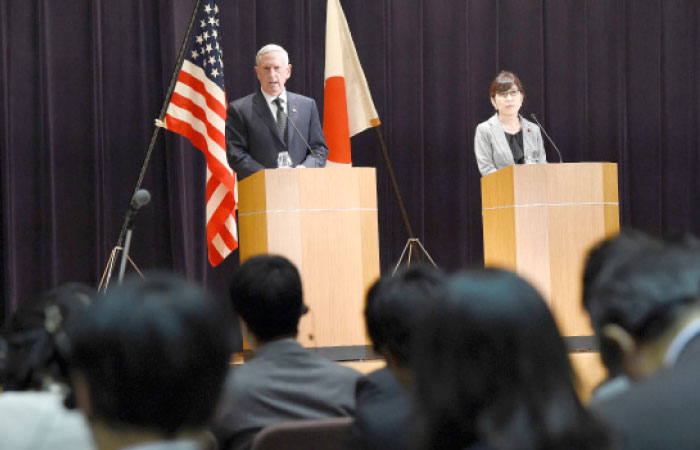 US Defense Secretary Jim Mattis (L) speaks while Japanese Defense Minister Tomomi Inada listens during a joint press conference at the defence ministry in Tokyo on Saturday. — AFP