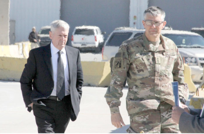 The new Pentagon chief and US Secretary of Defence, James Mattis (L), is welcomed by Lt. Gen. Stephen Townsend upon his arrival in the Iraqi capital Baghdad on Monday. — AFP