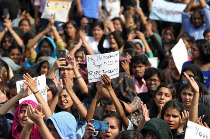 Posters are displayed during a march held on campus against violence and intimidation within Delhi University, India, on Tuesday. — Reuters