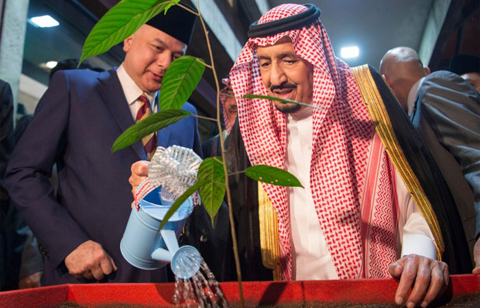 Custodian of the Two Holy Mosques King Salman plants a tree at University of Malaya in Kuala Lumpur on Monday. – SPA