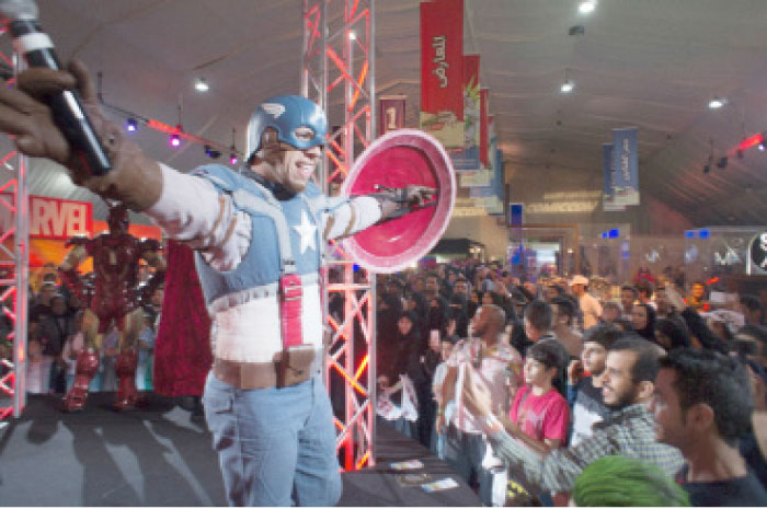 A man wears a Captain America costume representing a fictional superhero appearing in American comic books published by Marvel Comics, during the Saudi ComicCon, the first event of its kind to be held in Jeddah. — AP