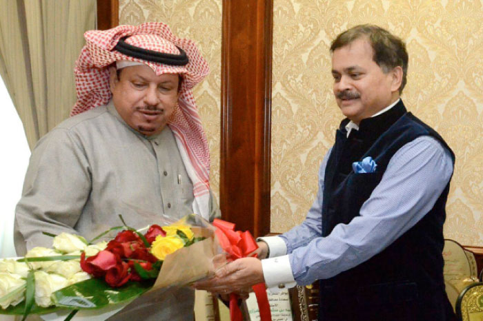 Indian Ambassador Ahmad Javed presenting a bouquet to Khafji Governor Mohammed Bin Sultan Al Hassa. — Courtesy photos