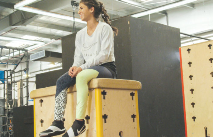 Amal Mourad, parkour trainer, looks on in a scene shot for the Nike ad campaign. — Reuters photos