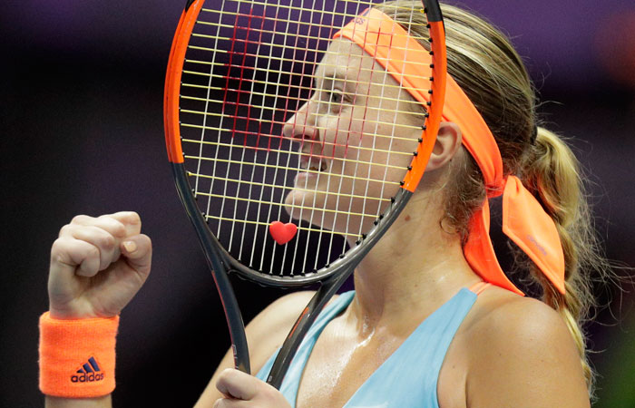 Kristina Mladenovic of France celebrates her victory over Roberta Vinci of Italy at the St. Petersburg Ladies Trophy-2017 Tennis Tournament Friday. — AP