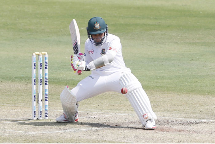 Bangladesh’s captain Mushfiqur Rahim plays a shot during the third day of the cricket Test match against India in Hyderabad Saturday. — AP