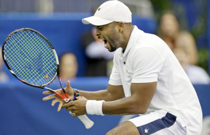 Donald Young of the US celebrates after defeating countryman John Isner at the Memphis Open Tennis Tournament Friday. — AP