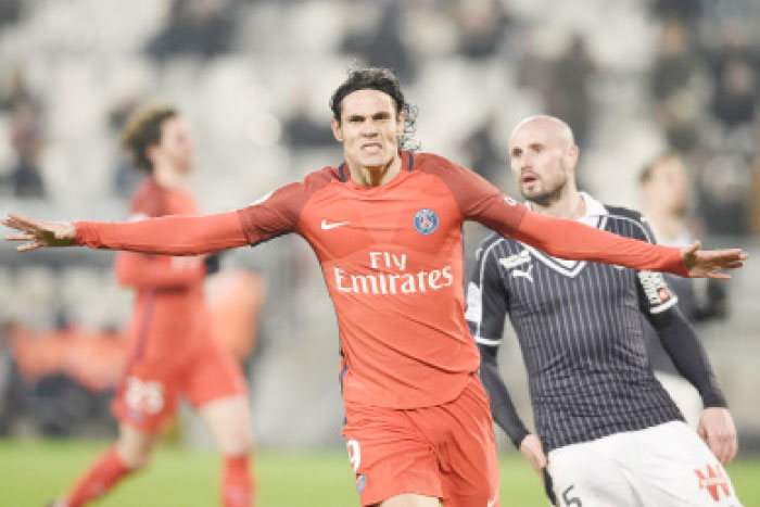 PSG forward Edinson Cavani celebrates after scoring against Bordeaux during the French Ligue 1 football match at the Matmut Atlantique Stadium in Bordeaux Friday. — AFP