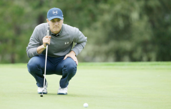 Jordan Spieth lines up a putt on the 13th hole during second round of the AT&T Pebble Beach Pro-Am at Spyglass Hill Golf Course in Pebble Beach Friday. — AFP