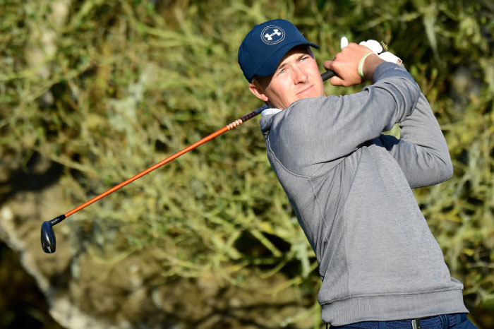 Jordan Spieth hits his tee shot on the 16th hole during third round of the AT&T Pebble Beach Pro-Am at Pebble Beach Golf Links Saturday. — AFP