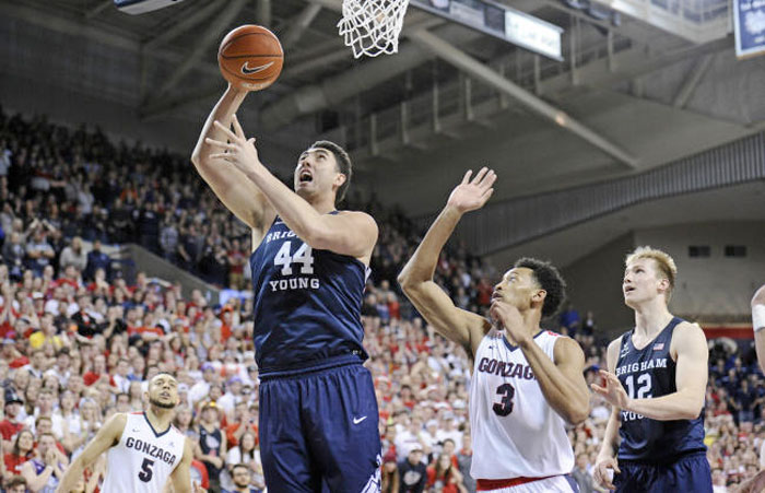 Brigham Young Cougars center Corbin Kaufusi (44) makes a basket against Gonzaga Bulldogs forward Johnathan Williams (3) during the second half at McCarthey Athletic Center. — Reuters