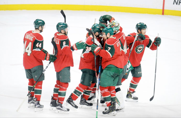 Minnesota Wild players celebrate their shootout victory over Tampa Bay Lightning at the Xcel Energy Center in Saint Paul, Minnesota, Friday. — Reuters