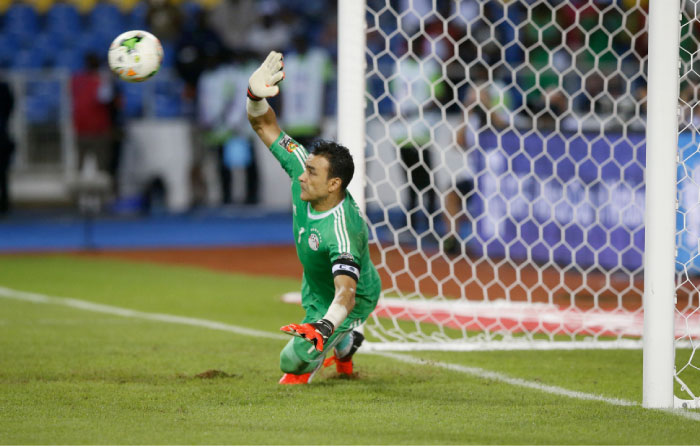Egypt’s goalkeeper Essam El-Hadary makes a save during the penalty shootout against Burkina Faso in the semifinal match of the Africa Cup of Nations in Libreville Wednesday. — Reuters