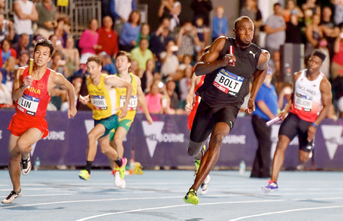 All-Stars’ captain Usain Bolt of Jamaica competes in the mixed 4x100m relay during the Nitro Athletics meet in Melbourne Thursday. — AFP