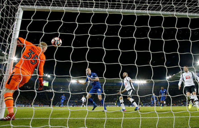 Leicester City's Andy King scores their first goal. — Reuters