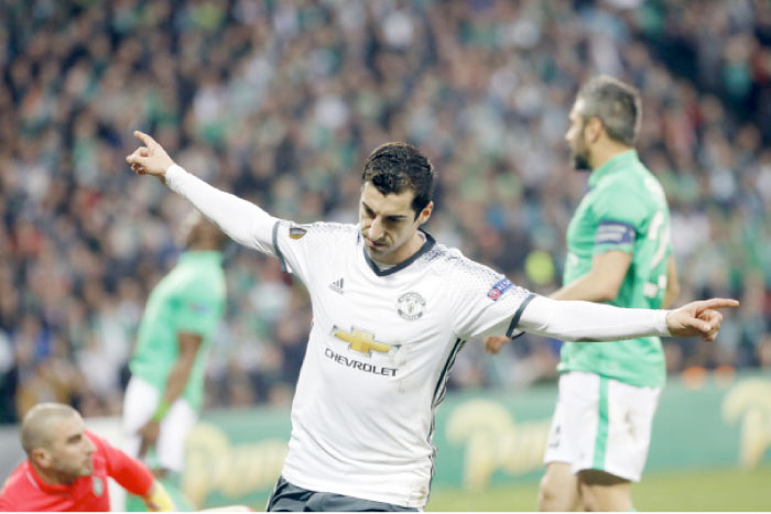 Manchester United’s Henrikh Mkhitaryan celebrates after scoring the opening goal during their Europa League round of 32 second leg soccer match against Saint Etienne at Geoffroy Guichard Stadium in Saint Etienne, France, Wednesday. — AP