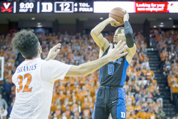 Jayson Tatum of the Duke Blue Devils shoots over London Perrantes of the Virginia Cavaliers during their game at John Paul Jones Arena in Charlottesville, Virginia, Wednesday. — AFP