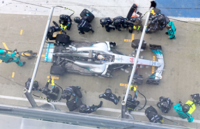 Mercedes’ Lewis Hamilton practices a pit stop at 2017 Mercedes Formula One Car Launch at Silverstone Thursday. — Reuters