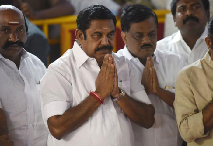 All India Anna Dravida Munnetra Kazhagam (AIADMK) party leader Edappadi Palanisamy, center, gestures as he pays his respects at the memorial for former state chief minister Jayalalithaa Jayaram after being sworn in as the chief minister of the state of Tamil Nadu in Chennai in this Feb. 16, 2017 file photo. — AFP