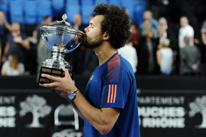 France's Jo-Wilfried Tsonga celebrates with his trophy after winning his ATP Marseille Open final match against France's Lucas Pouille Sunday. — AFP