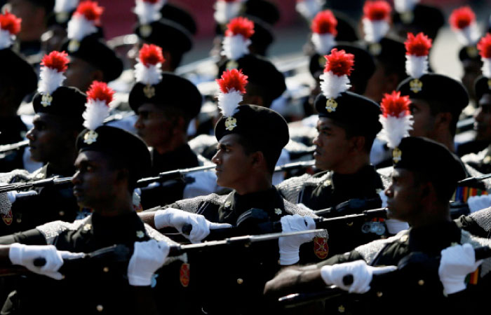Sri Lankan Army soldiers march during Sri Lanka’s 69th Independence day celebrations in Colombo, Sri Lanka on Saturday. — Reuters