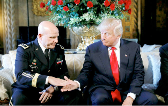 US President Donald Trump shakes hands with his new National Security Adviser Army Lt. Gen. H.R. McMaster after making the announcement at his Mar-a-Lago estate in Palm Beach, Florida, on Monday. — Reuters