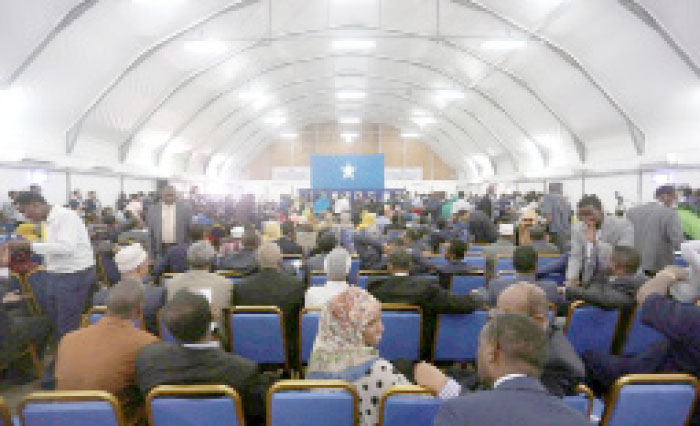 Somali lawmakers wait for their turn to cast their ballots during the presidential vote at the airport in Somalia’s capital Mogadishu Wednesday. — Reuters