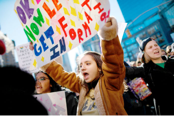 People take part in the “Not My President’s Day” rally in Manhattan, New York, on Monday. — Reuters