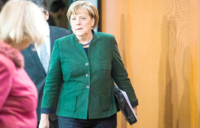 German Chancellor Angela Merkel arrives for the weekly cabinet meeting at the Chancellery in Berlin on Wednesday. — AFP