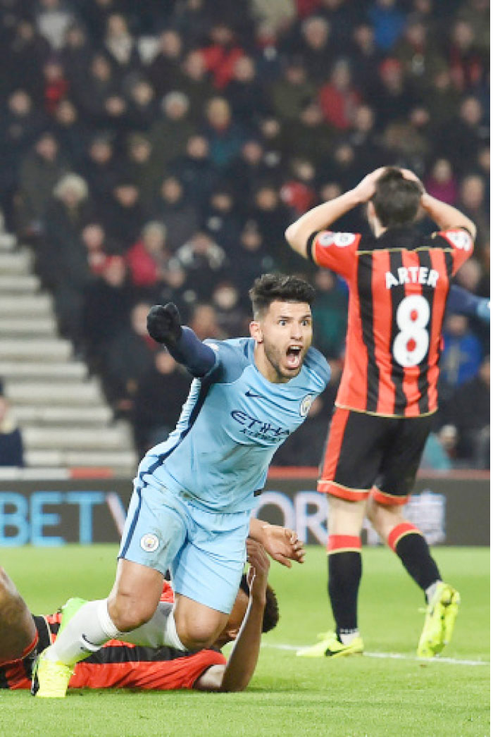 Manchester City’s Argentinian striker Sergio Aguero celebrates after scoring their second goal during the English Premier League football match between Bournemouth and Manchester City at the Vitality Stadium in Bournemouth, southern England on Monday. — AFP