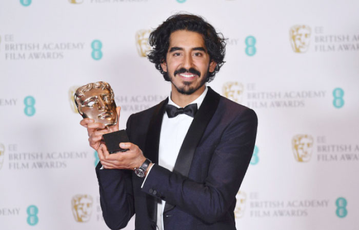 British actor Dev Patel poses with his Best Supporting Actor award for his work on the film “Lion” at the BAFTA British Academy Film Awards at the Royal Albert Hall in London on Monday. - AFP