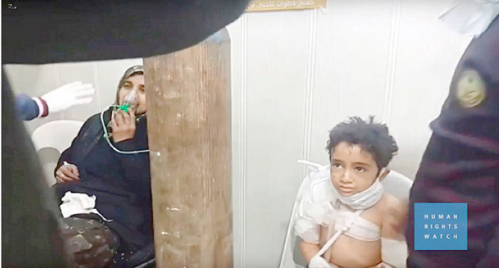 A still image from an undated video provided by Human Rights Watch claiming to show people treated in Aleppo, Syria, following a gas attack. — Reuters