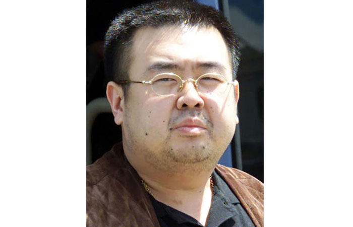 A man believed to be Kim Jong-Nam, son of North Korean leader Kim Jong-Il, gets off a bus to board an ANA905 (All Nippon Airways) airplane at Narita airport near Tokyo in this May 4, 2001 file photo. — AFP